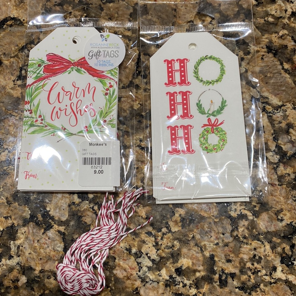 20 tags: 10 Warm Wishes & 10 HO HO HO gift tags. Red & green on white w/cording.